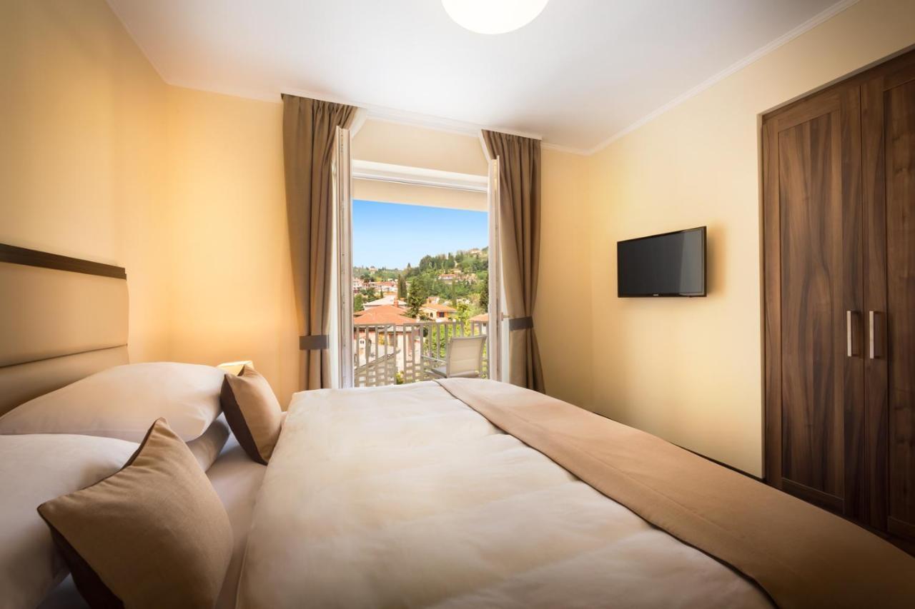 Remisens Casa Rosa - Hotel Metropol Annexe 포르토로즈 객실 사진